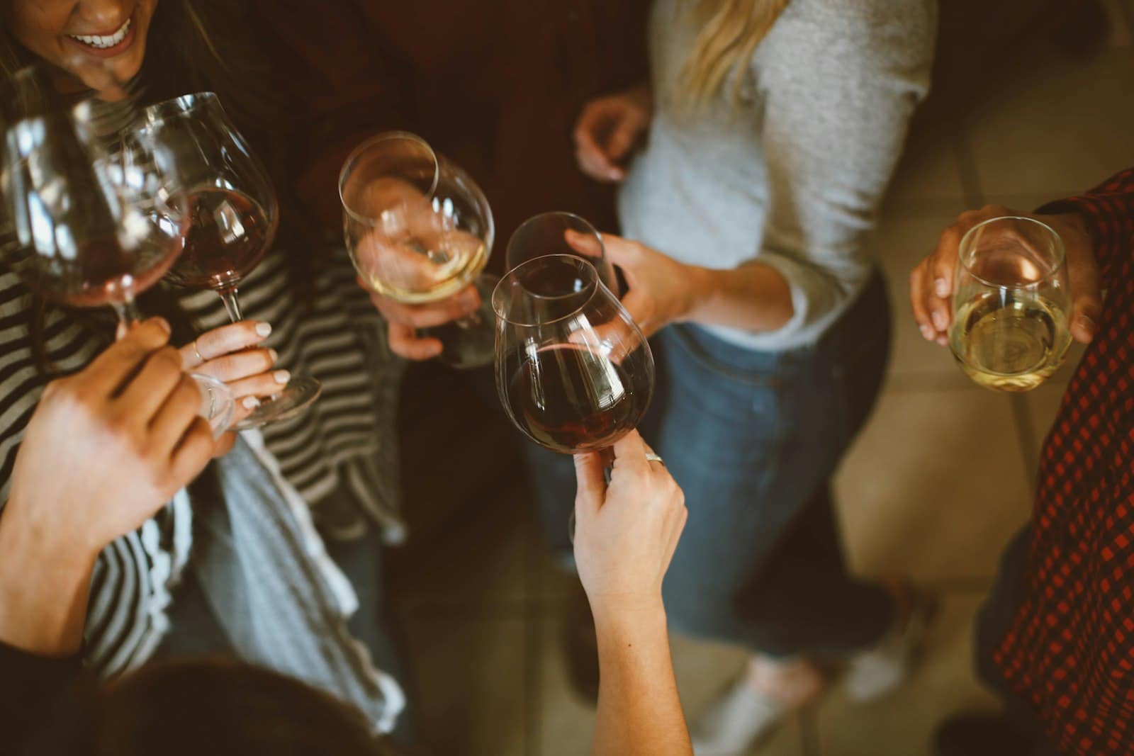 Colleagues raising glasses at an after-work social