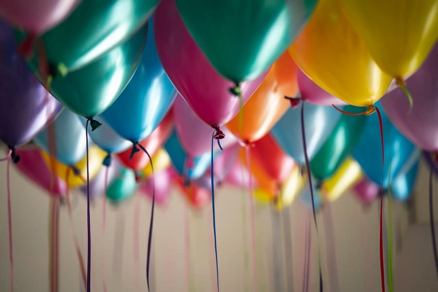 Colourful balloons with ribbons
