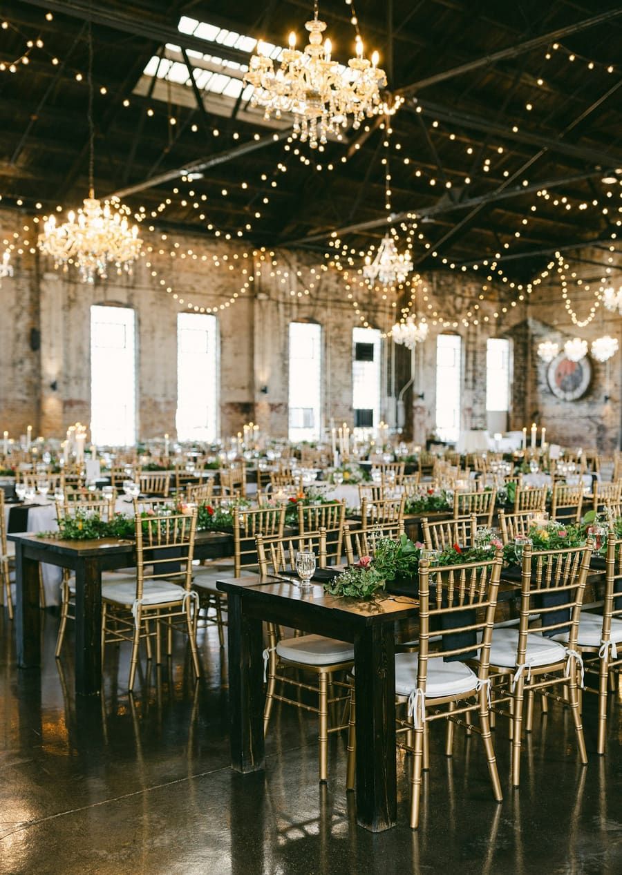 An elegant gala venue strung with string lights